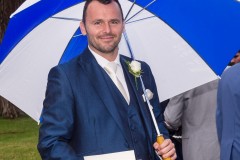 wedding guest with umbrella