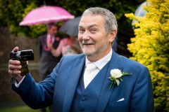 wedding guest with camera