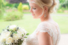 bride looking at flowers