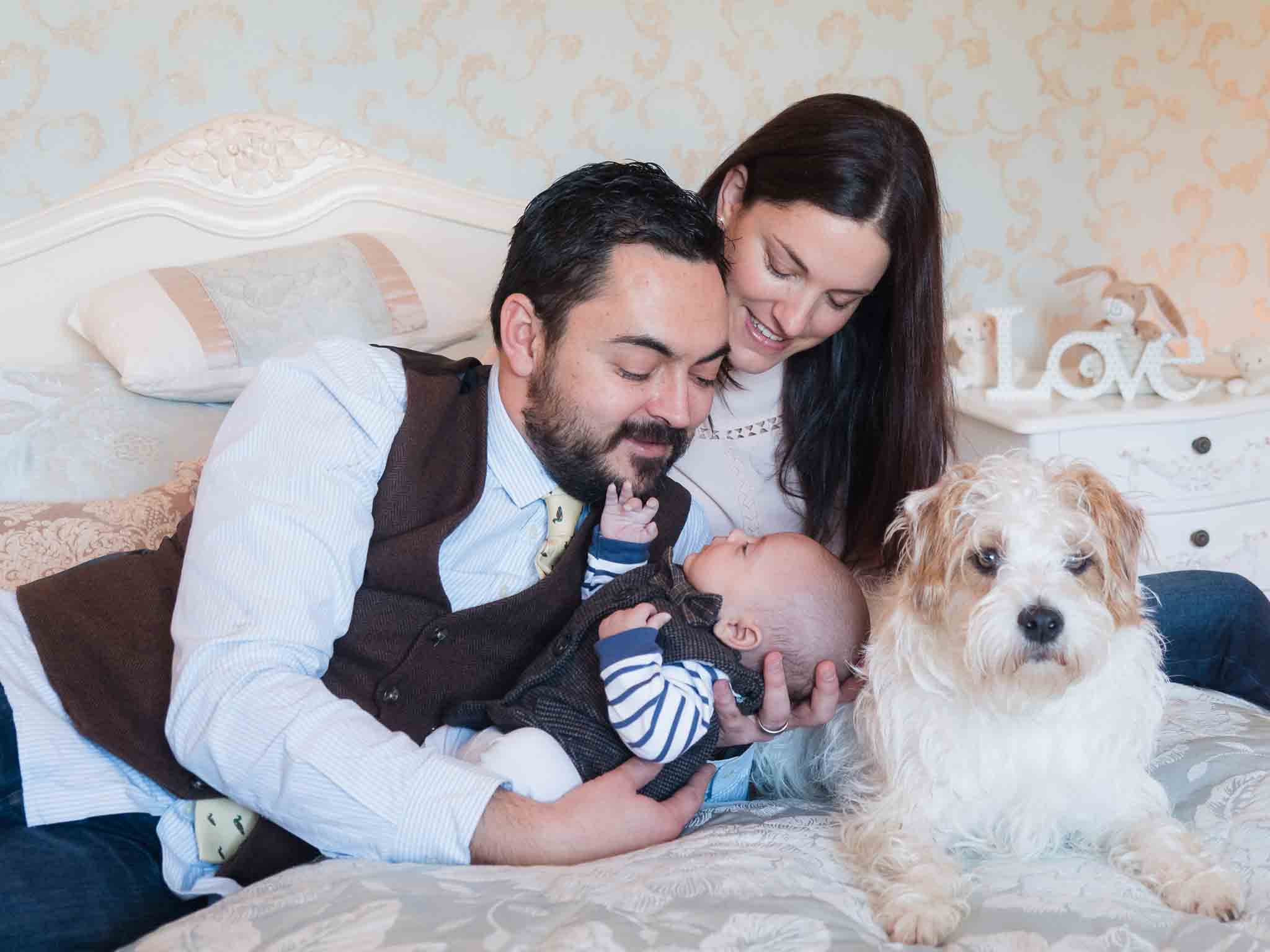 family portrait with baby and dog